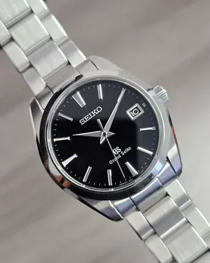 2016 Grand Seiko Heritage 40MM Quartz Black Dial Steel Bracelet 